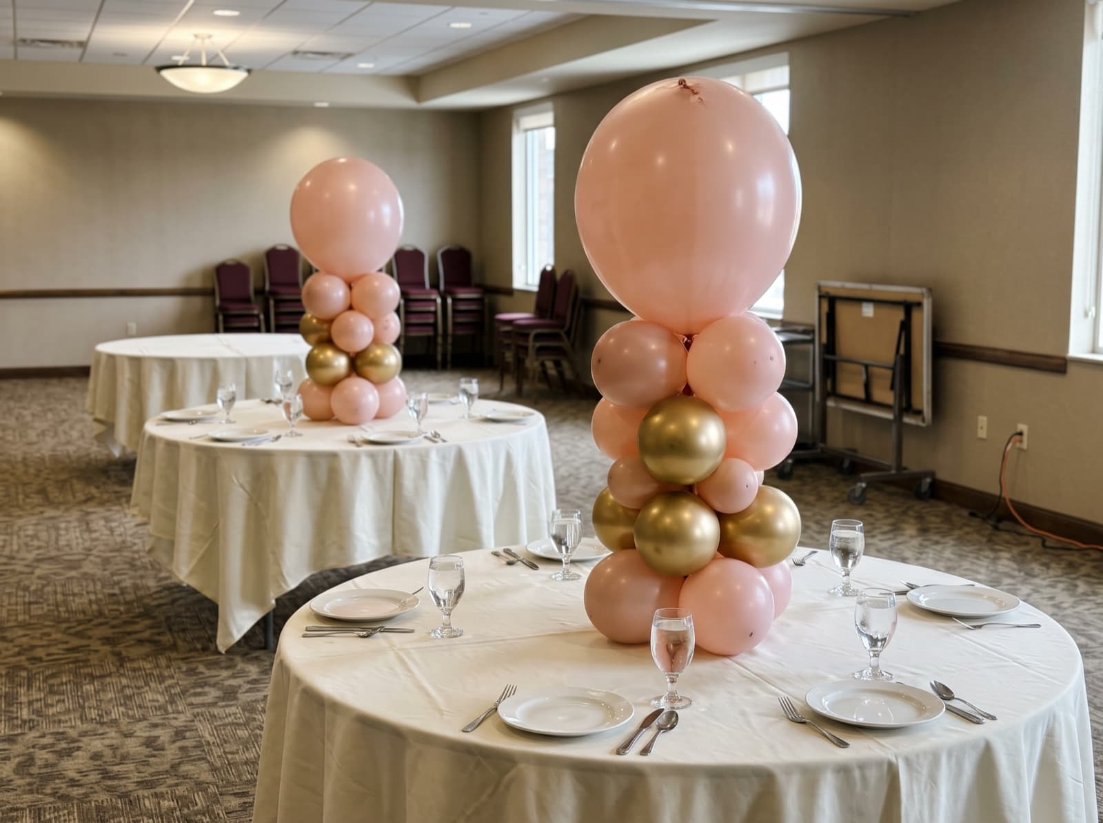 Mini tabletop balloon columns as centerpieces