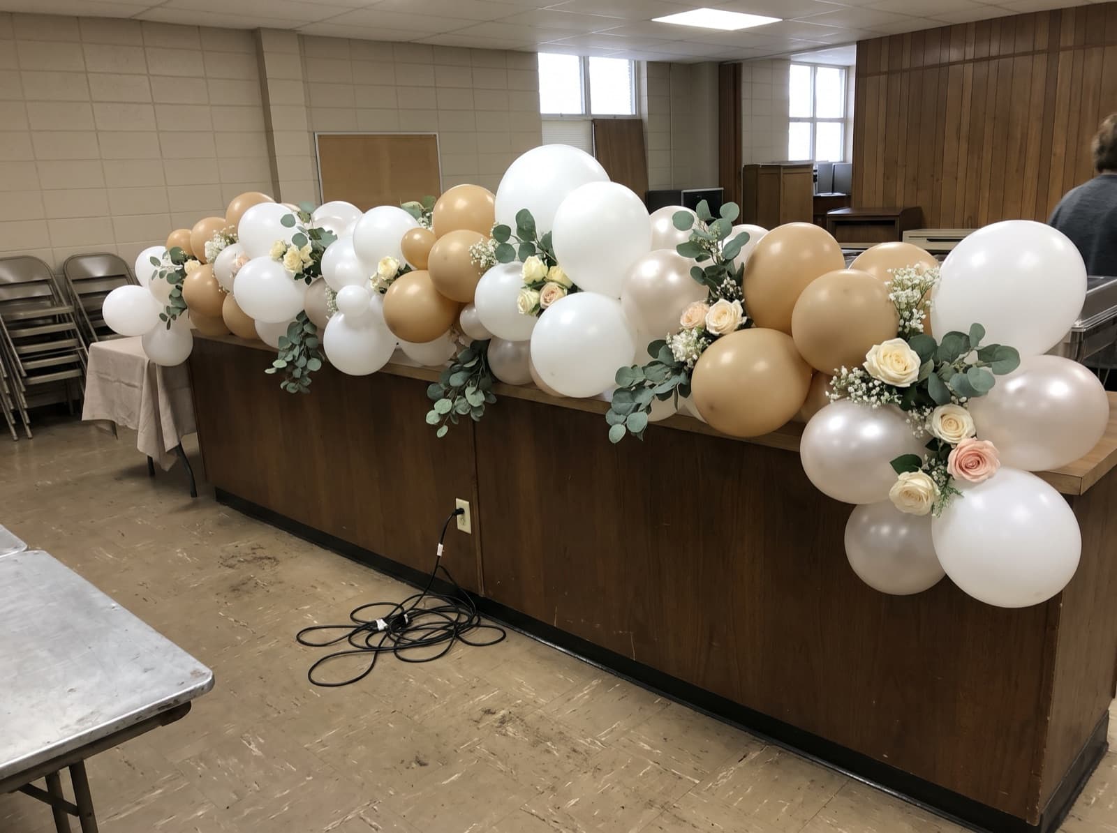Balloon garland with eucalyptus and silk flowers