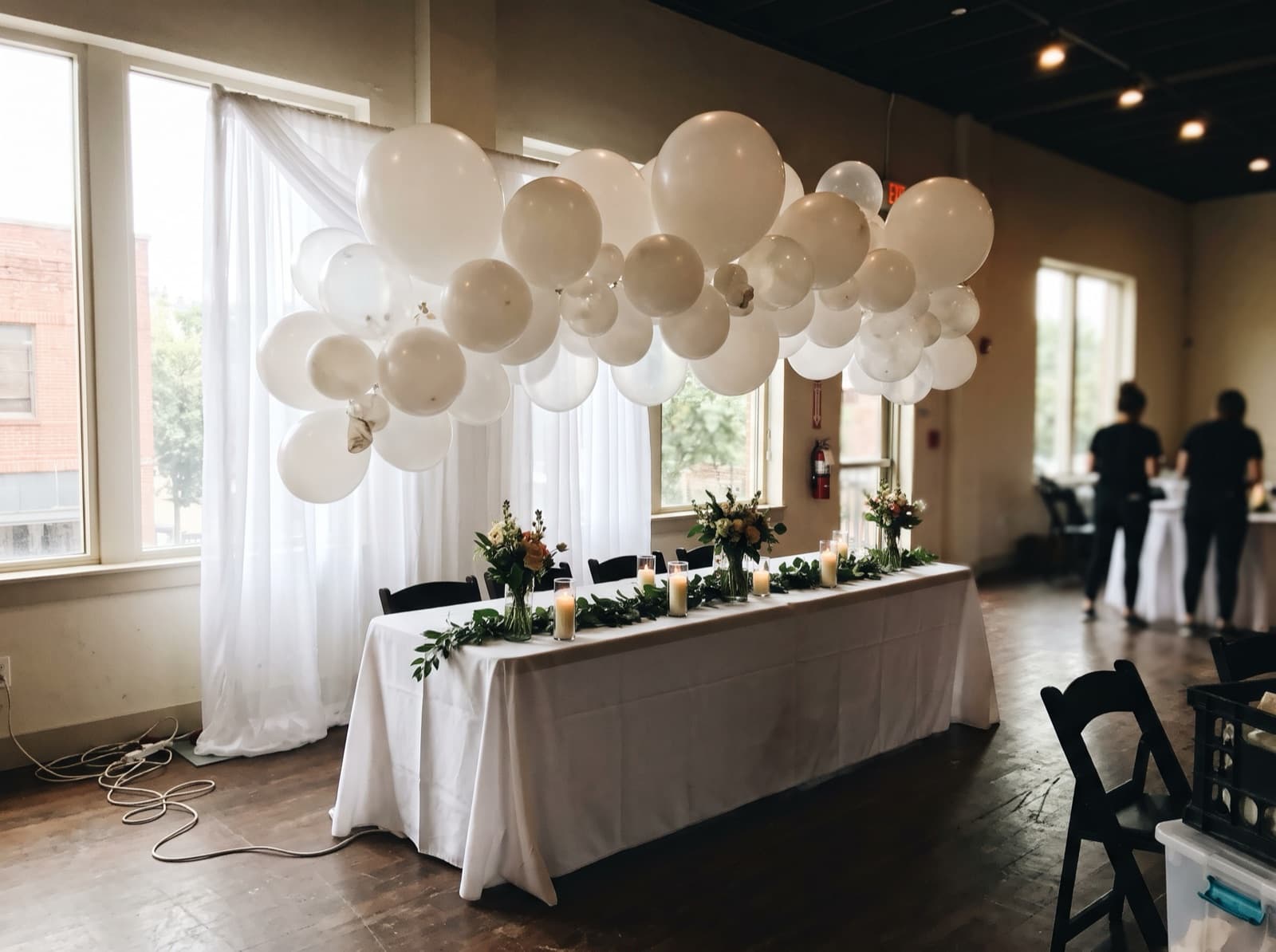 Balloon cloud over a sweetheart table