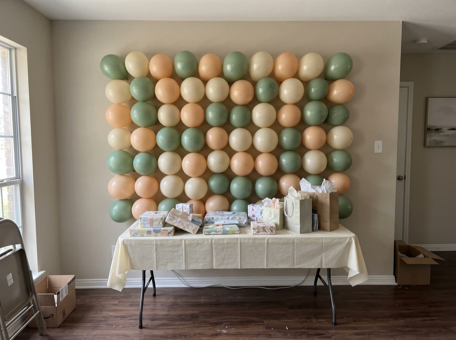 Pastel balloon wall for a baby shower